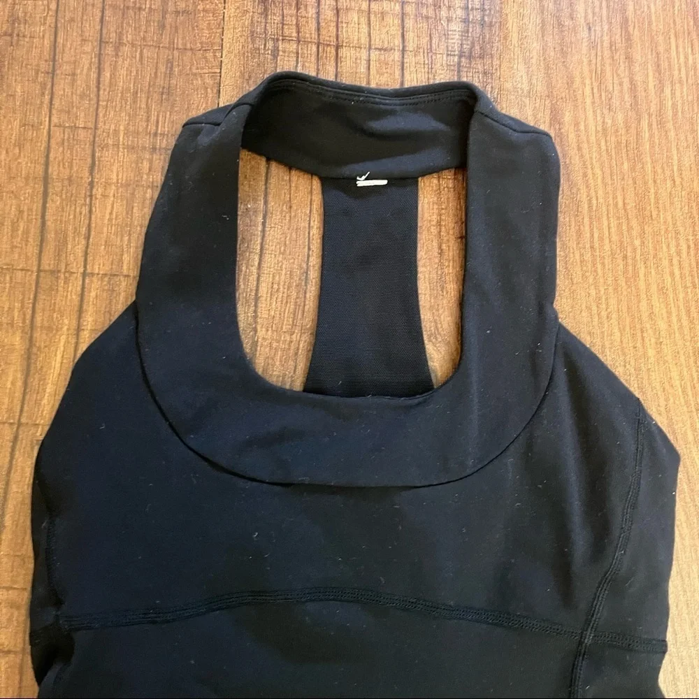 Lululemon Womens racerback activewear tank black silver reflective logo Sz 4